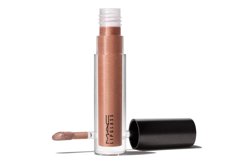 MAC Lipglass in a clear tube, with the applicator wand and open cap laying next to it.
