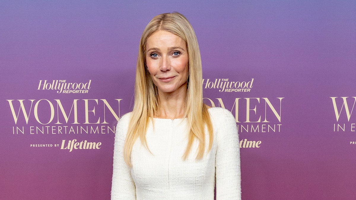 Gwyneth Paltrow standing at the Hollywood Reporter's Women in Entertainment Gala