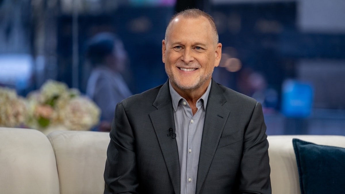 Dave Coulier sitting and speaking during an appearance on the Today show.