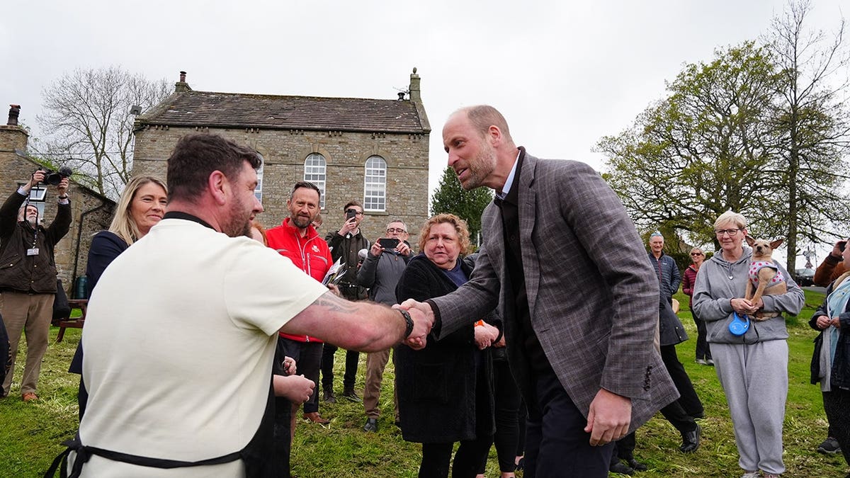 Prince William meeting well wishers at River Bain Hydro plant in Bainbridge England