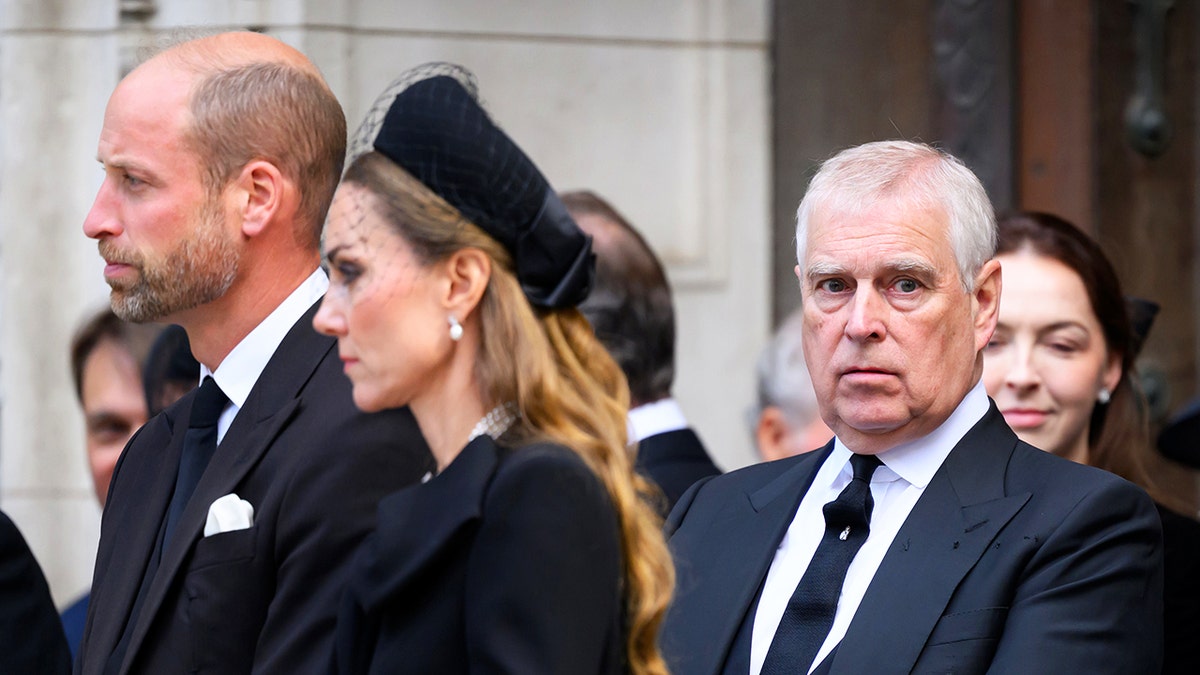 Prince William, Prince of Wales, Catherine, Princess of Wales, and former Prince Andrew, Duke of York, seated at Westminster Cathedral.