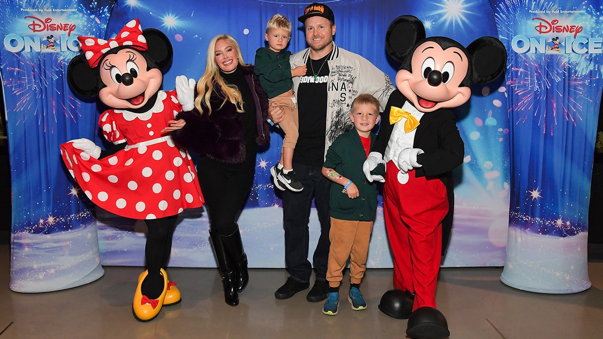 Heidi Montag, Ryker Pratt, Spencer Pratt and Gunner Pratt standing together at Crypto.com Arena