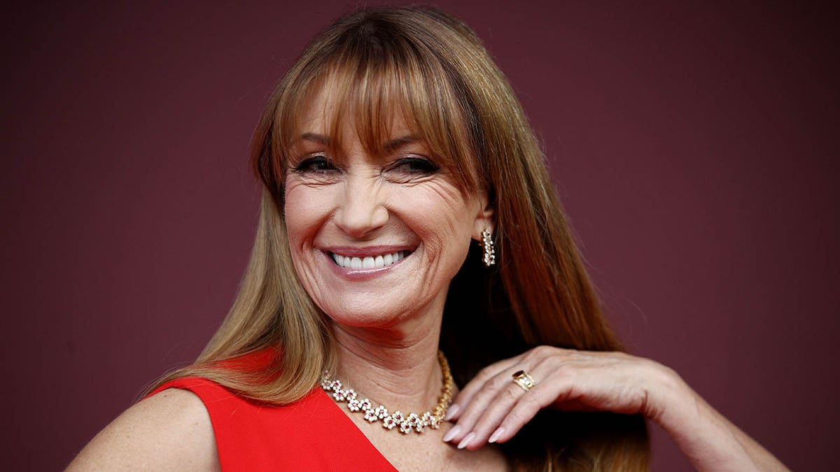 Jane Seymour smiling at camera wearing red at Ruby's Choice premiere in Sydney