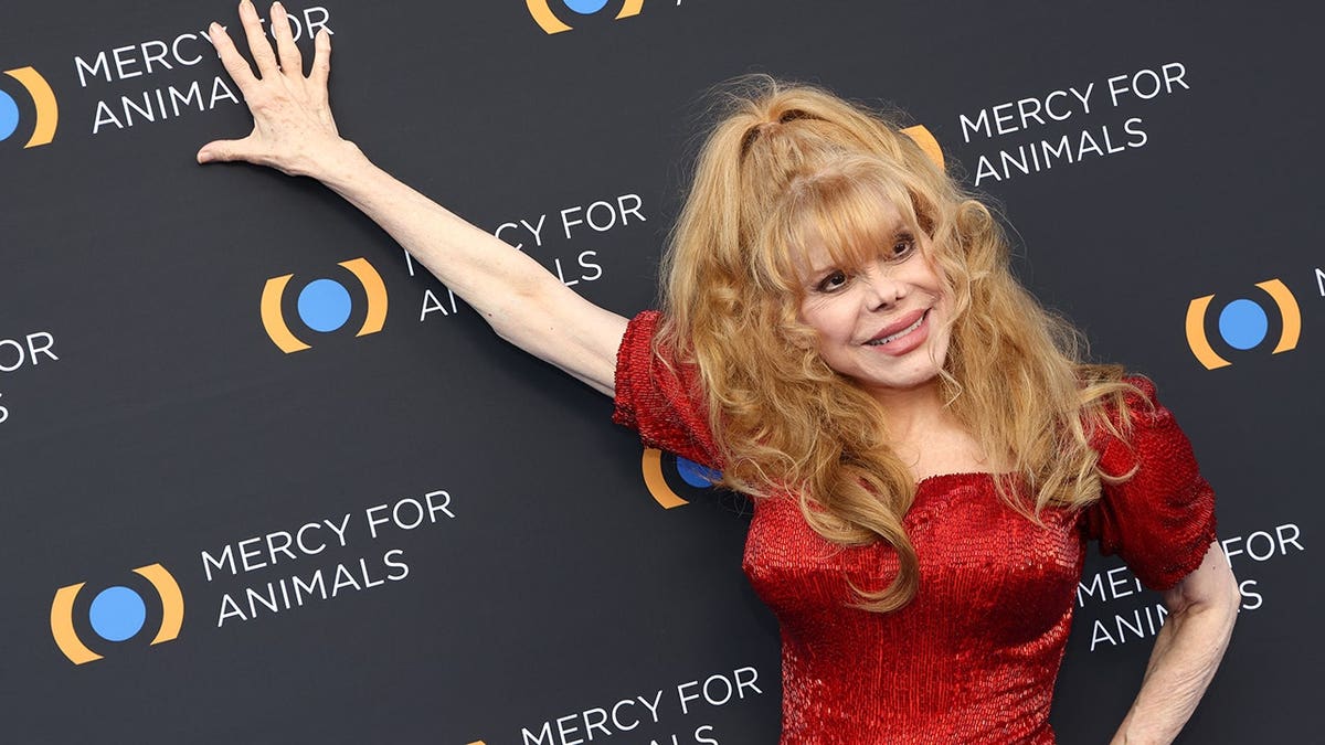 Charo wearing a red dress at the Mercy for Animals 25th Anniversary Gala in Los Angeles
