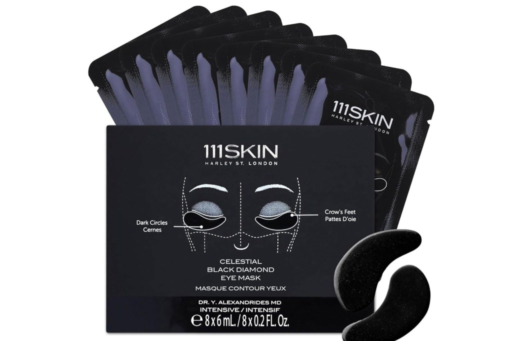 A box of 111SKIN Celestial Black Diamond Eye Masks with several individual packets of the eye masks.