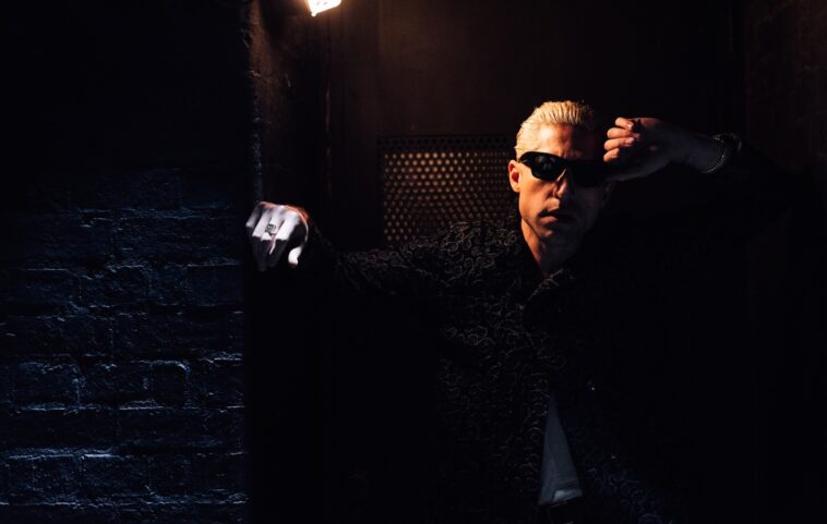 Queens Of The Stone Age's Michael Shuman shares summer-ready new single ‘LA’ featuring Lily James
