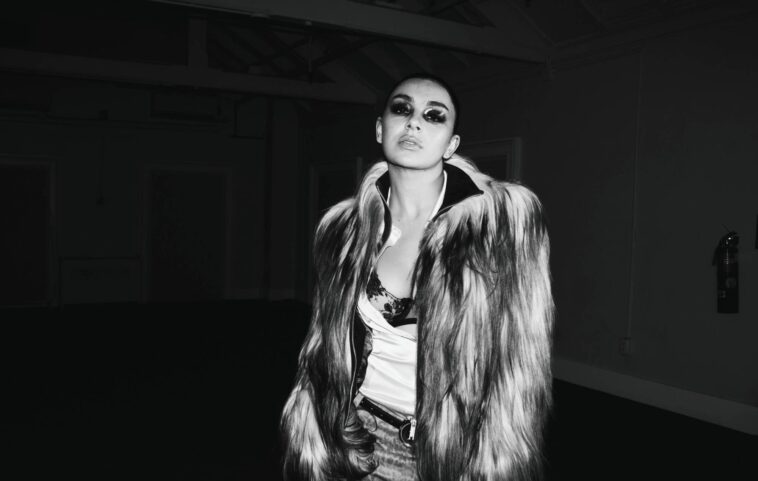 Watch Charli XCX's mosh-heavy video for new single 'Rock Music'